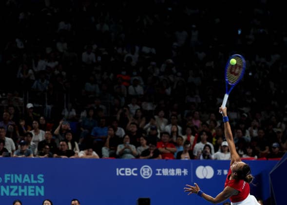 (260924) -- SHENZHEN, Sept. 24, 2026 -- Zheng Qinwen of China serves against Jasmine Paolini of Italy during the quarterfinal match between China and Italy at the 2026 Billie Jean King Cup Finals in Shenzhen, south China s Guangdong Province, Sept. 24, 2026. ) (SP)CHINA-SHENZHEN-TENNIS-BILLIE JEAN KING CUP-CHINA VS ITALY (CN) MaoxSiqian 
