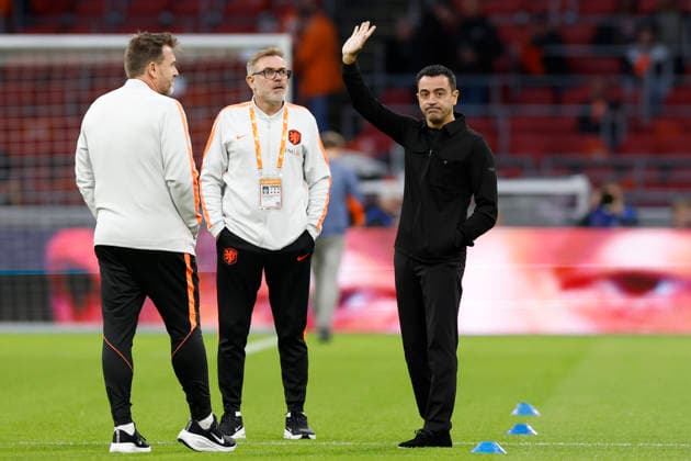 Amsterdam, Netherlands, 24th September 2026. Xavi Hernandez (R), head coach of the Netherlands walks on the pitch before the Netherlands vs Germany UEFA Nations League match at the Johan Cruyff Arena, Amsterdam. Picture credit should read: Cody Froggatt Sportimage EDITORIAL USE ONLY. No use with unauthorised audio, video, data, fixture lists, club league logos or live services. Online in-match use limited to 120 images, no video emulation. No use in betting, games or single club league player publications. SPI_006_CF_NETHERLANDS_V_GERMANY SPI-5017-0006