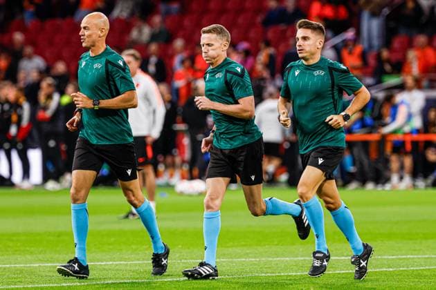 AMSTERDAM - Assistant referee Jose Naranjo, referee Alejandro Hernandez and assistant referee Diego Sanchez Rojo warm up ahead of the UEFA Nations League match between the Netherlands and Germany at the Johan Cruijff ArenA on 24 September 2026 in Amsterdam, the Netherlands. MARCEL TER BALS ANP UEFA Nations League 2026 27 xVIxANPxSportx xMarcelxterxBalsxIVx 569959462 originalFilename: 569959462.jpg