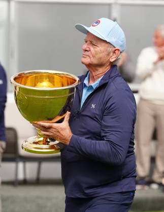 MEDINAH, IL - SEPTEMBER 24: Actor Bill Murray carries the Presidents Cup to the first tee during the Opening Ceremony before the start of the first round of the 2026 Presidents Cup at Medinah Country Club in Medinah, Illinois. (Photo by Brian Spurlock Icon Sportswire) GOLF: SEP 24 Presidents Cup EDITORIAL USE ONLY Icon2609245