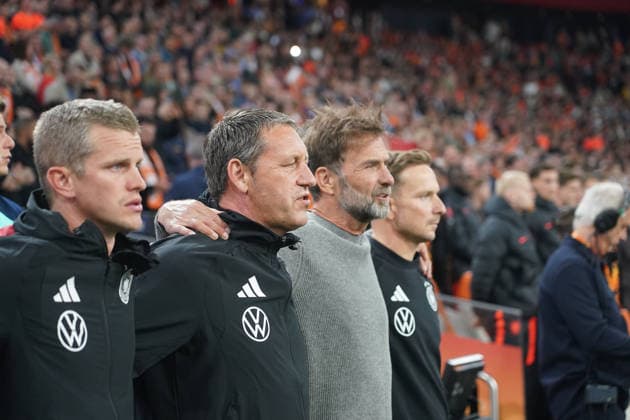 Germany National Team Coach Jürgen Klopp during the national anthem with Assistant Coach Sven Bender, Germany, Assistant Coach Peter Krawietz, Germany, Assistant Coach Pepijn Lijnders, Germany, Amsterdam, September 24, 2026: Netherlands vs. Germany, Nations League Matchday 1, Johan Cruijff Arena
