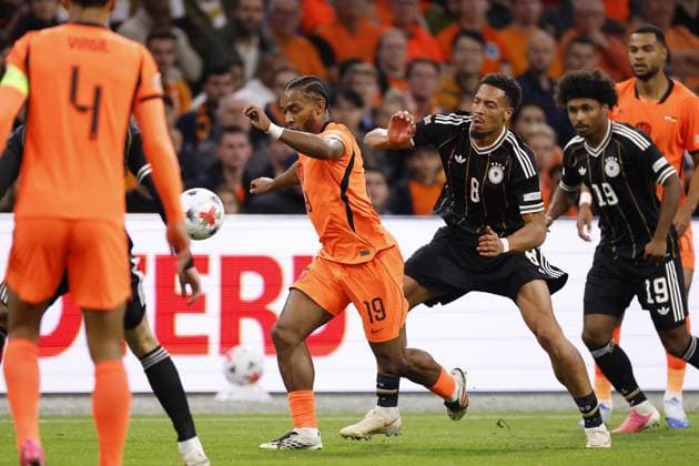 AMSTERDAM - (LR) Quinten Timber of the Netherlands, Felix Nmecha of Germany, Karim Adeyemi of Germany during the UEFA Nations League match between the Netherlands and Germany at the Johan Cruijff ArenA on 24 September 2026 in Amsterdam, the Netherlands. MAURICE VAN STEEN ANP UEFA Nations League 2026 27 xVIxANPxSportx xMauricexvanxSteenxIVx 569965262 originalFilename: 569965262.jpg