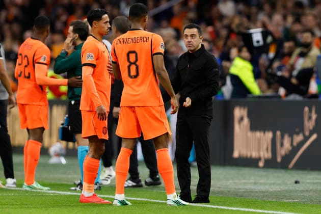Amsterdam, Netherlands, 24th September 2026. Xavi Hernandez, head coach of Netherlands talks with Tijjani Reijnders (L) and Ryan Gravenberch of the Netherlands during the Netherlands vs Germany UEFA Nations League match at the Johan Cruyff Arena, Amsterdam. Picture credit should read: Cody Froggatt Sportimage EDITORIAL USE ONLY. No use with unauthorised audio, video, data, fixture lists, club league logos or live services. Online in-match use limited to 120 images, no video emulation. No use in betting, games or single club league player publications. SPI_042_CF_NETHERLANDS_V_GERMANY SPI-5017-0042