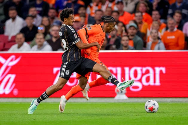 September 24, 2026, Soccer, International Match, Netherlands vs. Germany, Kickoff of the 2026–2027 UEFA Nations League, Matchday 1, Johan Cruijff ArenA, Amsterdam, 2026–27 season. Crysencio Summerville (NED, 07) in a tackle against Nathaniel Brown (GER, 18). DFB regulations prohibit any use of photographs as image sequences and or quasi-video. Netherlands