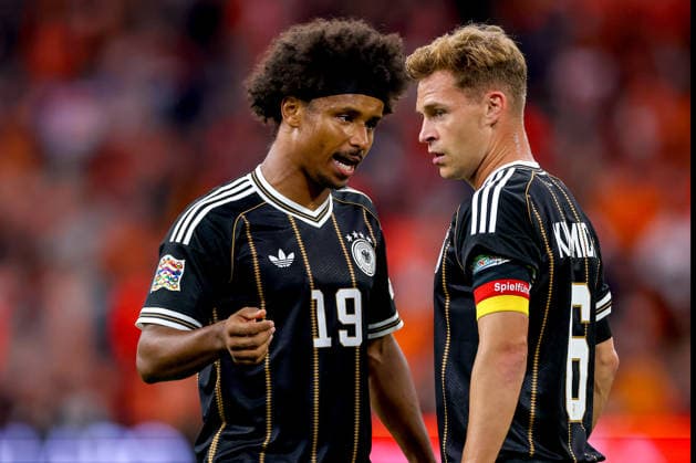 September 24, 2026, Soccer, International Match, Netherlands vs. Germany, Kickoff of the 2026–2027 UEFA Nations League, Matchday 1, Johan Cruijff ArenA, Amsterdam, 2026–27 season: Karim Adeyemi (GER 19) gesturing next to Joshua Kimmich (GER 06). DFB regulations prohibit any use of photographs as image sequences and or quasi-video. Netherlands