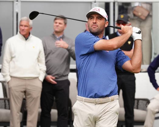 MEDINAH, IL - SEPTEMBER 24: Team USA golfer Scottie Scheffler plays his tee shot on the first hole during the first round of the 2026 Presidents Cup on September 24, 2026, at Medinah Country Club in Medinah, Illinois. (Photo by Brian Spurlock Icon Sportswire) GOLF: SEP 24 Presidents Cup EDITORIAL USE ONLY Icon26092412