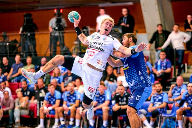 Marek Nissen 6, HC Erlangen in a one-on-one battle with Malte Donker 39, TVB 1898 Stuttgart September 24, 2026 Handball DHB Cup Season 2026–2027 Round 2 TVB 1898 Stuttgart vs. HC Erlangen Nuremberg Metropolitan Region HCE PeKo xpexkox