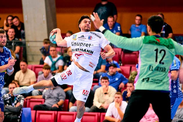 Eloy Morante Maldonado, 22, of HC Erlangen in a one-on-one battle with Mohamed Essam Moustafa El Tayar, 12, TVB 1898 Stuttgart, September 24, 2026, Handball, DHB Cup, 2026–2027 Season, Round 2, TVB 1898 Stuttgart vs. HC Erlangen, Nuremberg Metropolitan Region, HCE PeKo, xpexkox