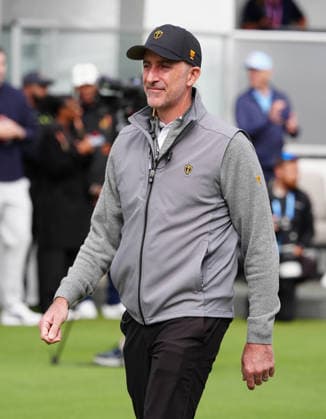 MEDINAH, IL - SEPTEMBER 24: International Presidents Cup team captain Geoff Ogilivy walks across the first tee during the first round of the 2026 Presidents Cup on September 24, 2026, at Medinah Country Club in Medinah, Illinois. (Photo by Brian Spurlock Icon Sportswire) GOLF: SEP 24 Presidents Cup EDITORIAL USE ONLY Icon26092416