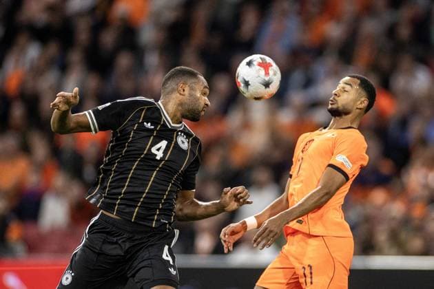 AMSTERDAM - (lr) Jonathan Tah of Germany, Cody Gakpo of the Netherlands during the UEFA Nations League match between the Netherlands and Germany at the Johan Cruijff ArenA on 24 September 2026 in Amsterdam, the Netherlands. ANP KOEN VAN WEEL UEFA Nations League 2025 26 xVIxANPxSportx xxANPxIVx 569966100 originalFilename: 569966100.jpg