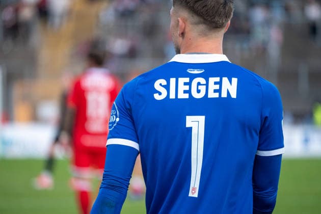 Germany Friendly Match, 2026-2027 Preseason: Sportfreunde Siegen vs. Borussia Mönchengladbach, Thursday, September 24, 2026, Leimbach Stadium, Siegen, Marcel Johnen, Sportfreunde Siegen, 1 close-up shot, logo, Siegen, Siegen, Leimbach Stadium, Germany Copyright: xOrhanxHabashx