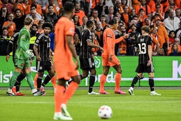 AMSTERDAM - Netherlands goalkeeper Bart Verbruggen and Netherlands captain Virgil van Dijk (lr), among others, have words after 0-1 with Germany Karim Adeyemi and Germany Philipp Treu (lr) during the UEFA Nations League match between the Netherlands and Germany at the Johan Cruijff ArenA on September 24, 2026 in Amsterdam, the Netherlands. ANP OLAF KRAAK UEFA Nations League 2025 26 xVIxANPxSportx xxANPxIVx 569968359 originalFilename: 569968359.jpg