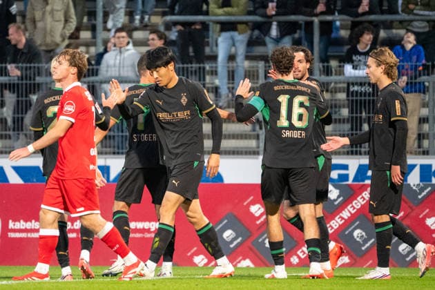 Germany Friendly Match, 2026–2027 Preseason: Sportfreunde Siegen vs. Borussia Mönchengladbach, Thursday, September 24, 2026, Leimbach Stadium, Siegen: Goal and celebration after Shuto Machino (Borussia Mönchengladbach, 18) scores the 2–0 goal; joy, excitement, and cheers with Philipp Sander (Borussia Mönchengladbach, 16), Siegen, Leimbach Stadium, Germany Copyright: xOrhanxHabashx