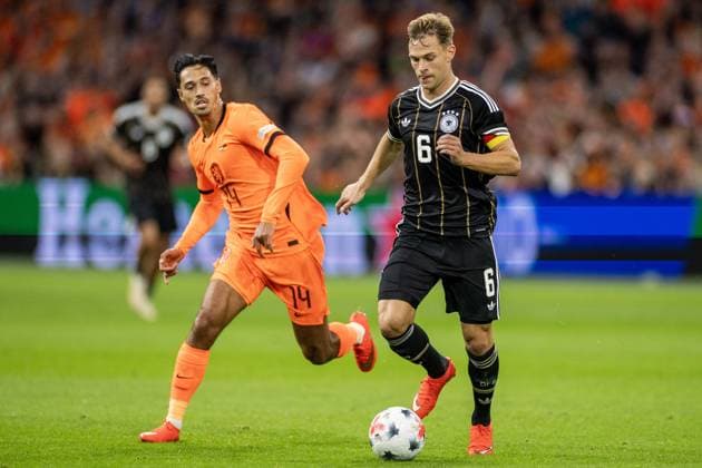 AMSTERDAM - (lr) Tijjani Reijnders of the Netherlands, Joshua Kimmich of Germany during the UEFA Nations League match between the Netherlands and Germany at the Johan Cruijff ArenA on 24 September 2026 in Amsterdam, the Netherlands. ANP KOEN VAN WEEL UEFA Nations League 2025 26 xVIxANPxSportx xxANPxIVx 569968396 originalFilename: 569968396.jpg