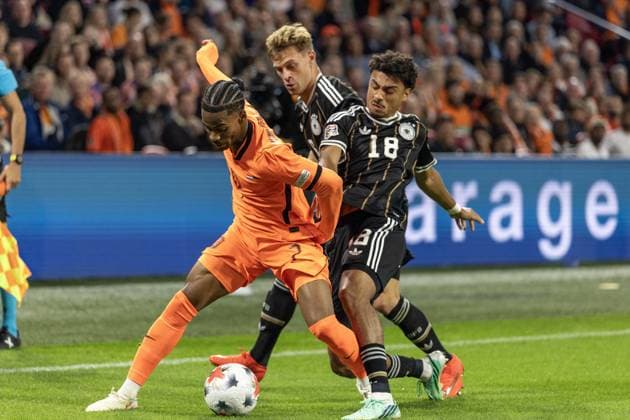 AMSTERDAM - (lr) Crysencio Summerville of the Netherlands, Joshua Kimmich of Germany, Nathaniel Brown of Germany during the UEFA Nations League match between the Netherlands and Germany at the Johan Cruijff ArenA on 24 September 2026 in Amsterdam, the Netherlands. ANP KOEN VAN WEEL UEFA Nations League 2025 26 xVIxANPxSportx xxANPxIVx 569968415 originalFilename: 569968415.jpg
