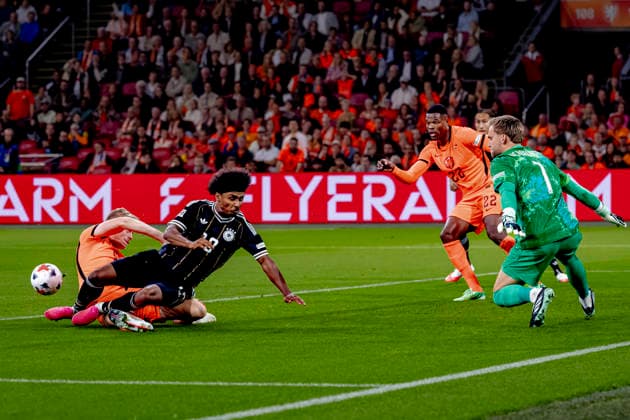 AMSTERDAM: Netherlands defender Jan Paul van Hecke and Germany midfielder Karim Adeyemi during the UEFA Nations League match between the Netherlands and Germany at the Johan Cruijff ArenA on September 24, 2026, in Amsterdam, Netherlands. Photo by DeFodi Images
