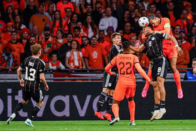 AMSTERDAM - Virgil van Dijk of the Netherlands heads the ball with Felix Nmecha of Germany during the UEFA Nations League match between the Netherlands and Germany at the Johan Cruijff ArenA on 24 September 2026 in Amsterdam, the Netherlands. MARCEL TER BALS ANP UEFA Nations League 2026 27 xVIxANPxSportx xMarcelxterxBalsxIVx 569968692 originalFilename: 569968692.jpg
