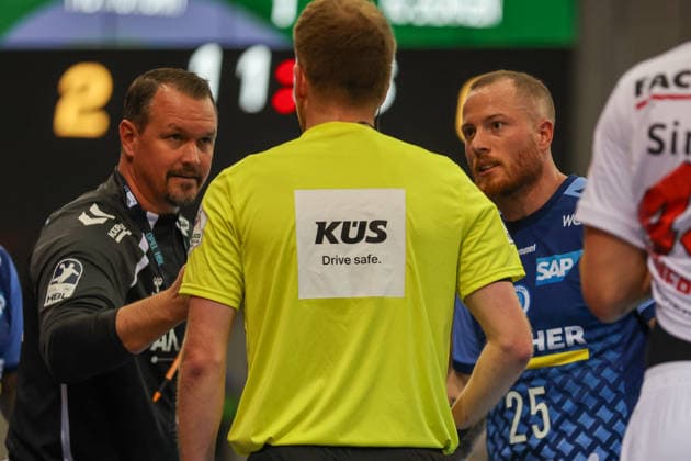 Misha Kaufmann (TVB Stuttgart, coach) and Patrick Zieker (TVB Stuttgart, 25) talking with the referee (GER) during the TVB Stuttgart vs. HC Erlangen handball match, DHB Cup, Matchday 2, 2026–2027 season, September 24, 2026, GER, TVB Stuttgart vs. HC Erlangen, Handball, DHB Cup, Matchday 2, 2026–2027 season, September 24, 2026, Stuttgart Copyright: xEibner-Pressefoto SoerenxHerwegx EP_SHG