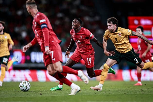 September 24, 2026, Lisboa, Lisboa, Portugal: Nuno Mendes of Portugal national team, Nationalteam is tackled by Kieffer Moore of Wales National Team during the UEFA Nations League 2026Ã¢â‚¬27 League Phase Matchday 1 match between Portugal and Wales at Estadio Jose Alvalade in Lisbon, Portugal Lisboa Portugal - ZUMAg283 20260924_zsp_g283_059 Copyright: xJoaoxGregoriox