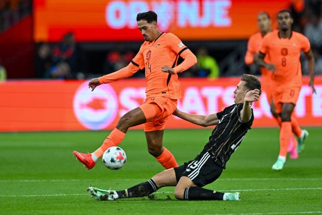 From left: Tijjani Reijnders (Netherlands) 14 and Nico Schlotterbeck (Germany) 15 in a one-on-one battle, September 24, 2026 ¢ Soccer ¢ Nations League ¢ Netherlands vs. Germany, Johan Cruyff Arena, Amsterdam, North Holland, Germany Copyright: xpepphotox xHorstxMauelshagenx pep00321, pep_20260924_hm