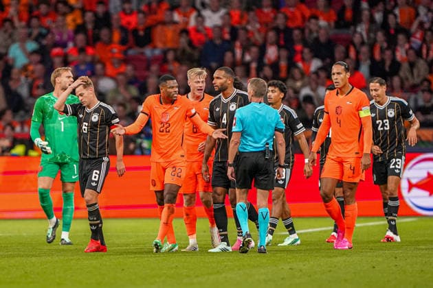 2026-09-24 Netherlands v Germany - Nations League AMSTERDAM, NETHERLANDS - SEPTEMBER 24: Denzel Dumfries of the Netherlands is in conversation with Alejandro Hernandez referee during the Nations League match between Netherlands and Germany at Johan Cruijff ArenA Amsterdam Johan Cruijff ArenA Netherlands Content not available for redistribution in The Netherlands directly or indirectly through any third parties. Copyright: xAndrexWeeningx