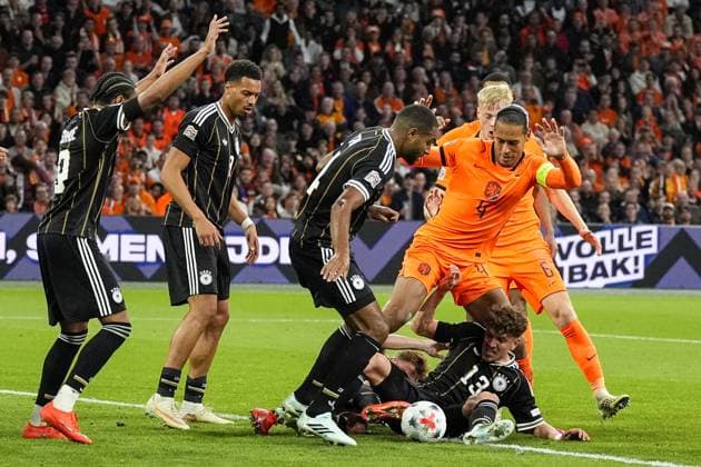 AMSTERDAM , 24-09-2026 , JohanCruyff Arena , season 2026 2027 , UEFA Nations League football , Match between The Netherlands and Germany , picture shows Netherlands player Virgil van Dijk and Germany player Philipp Treu Netherlands - Germany  x207515680x Copyright:
