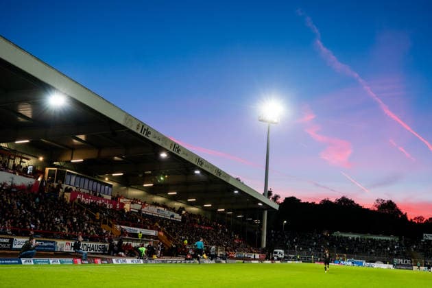 Germany Friendly Match, 2026-2027 Preseason: Sportfreunde Siegen vs. Borussia Mönchengladbach, Thursday, September 24, 2026, Leimbach Stadium, Siegen: Fans, Ultras, View, Sky, Skyline, Sports Facility, Stadium, Interior View, Wide Shot, Grandstand, Spectators, Fans, Seats, Roof Structure, Floodlights, Playing Field, Turf, Sprinklers, sideline, advertising banners, sponsors, Siegen Leimbach Stadium, Germany Copyright: xOrhanxHabashx
