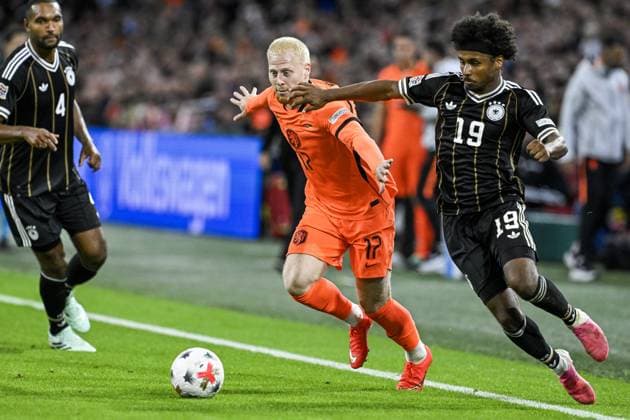 AMSTERDAM - Jonathan Tah of Germany, Mexx Meerdink of the Netherlands, Karim Adeyemi of Germany (lr) during the UEFA Nations League match between the Netherlands and Germany at the Johan Cruijff ArenA on 24 September 2026 in Amsterdam, the Netherlands. ANP OLAF KRAAK UEFA Nations League 2025 26 xVIxANPxSportx xxANPxIVx 569977425 originalFilename: 569977425.jpg