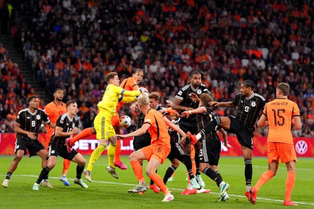UEFA Nations League: The Netherlands v Germany Amsterdam - Goalkeeper Marc-andre ter Stegen of Germany, Virgil van Dijk of The Netherlands, Jonathan Tah of Germany, Kevin Schade of Germany during the 2026 2027 UEFA Nations League Matchday 1 in League A Group A2. The match is set between The Netherlands and Germany at Johan Cruijff ArenA on 24 September 2026 in Amsterdam, Netherlands. (Hero Images Nick Koole) Copyright: xNickxKoolex
