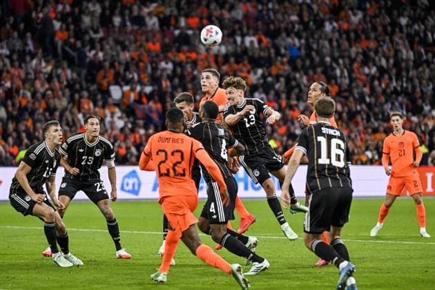 AMSTERDAM - Micky van de Ven of the Netherlands, Younes Ebnoutalib of Germany (lr) during the UEFA Nations League match between the Netherlands and Germany at the Johan Cruijff ArenA on 24 September 2026 in Amsterdam, the Netherlands. ANP OLAF KRAAK UEFA Nations League 2025 26 xVIxANPxSportx xxANPxIVx 569980575 originalFilename: 569980575.jpg