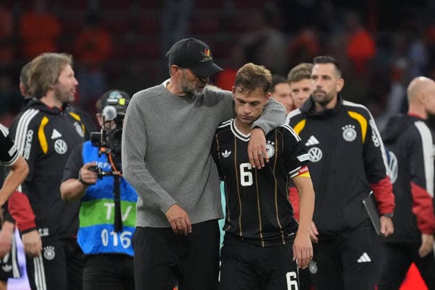 National Team Coach Jürgen Klopp of Germany cheers on Joshua Kimmich of Germany after the 1-1 draw in Amsterdam on September 24, 2026, between the Netherlands and Germany, Nations League Matchday 1, at the Johann Cruijff Arena