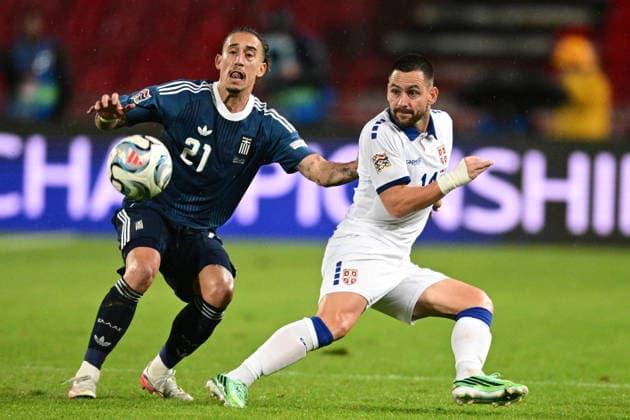 UEFA Nations League - Serbia vs Greece - Kostas Tsimikas of Greece in action against Andrija Å½ivkoviÄ‡ of Serbia during the UEFA Nations League group A2 matchday 1 soccer match between Serbia and Greece held at Stadion Rajko MitiÄ‡ in Belgrade, Serbia, 25 September 2026. IMAGO ONE INCH PRODUCTIONS BELGRADE SERBIA Copyright: xONExINCHxPRODUCTIONSx 7097665