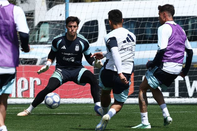 Argentine goalkeeper Santiago Beltran C prepares to save a shot from his teammate, midfielder Lionel Flores, during a training session at the AFA (Argentine Football Association) training center in Ezeiza, Buenos Aires province, on September 24, 2026, ahead of upcoming friendly matches against Bolivia, Burkina Faso, and Benin EZEIZA, ARGENTINA Copyright: xAlejandroxPAGNIx