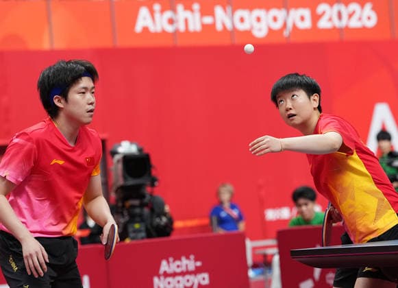 (260925) -- TOYOTA, Sept. 25, 2026 -- Wang Chuqin Sun Yingsha (R) compete during the mixed doubles quarterfinals of Table tennis, Tischtennis between Wang Chuqin Sun Yingsha of China and Matsushima Sora Harimoto Miwa of Japan at the 20th Asian Games Aichi-Nagoya 2026 in Toyota of Aichi Prefecture, Japan, Sept. 25, 2026. ) (SP)JAPAN-TOYOTA-ASIAN GAMES-TABLE TENNIS-MIXED DOUBLES CheongxKamxKa 