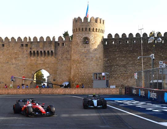 (260925) -- BAKU, Sept. 25, 2026 -- Ferrari s Charles Leclerc (L) of Monaco and Mercedes Andrea Kimi Antonelli of Italy compete during the practice session of the Formula One Azerbaijan Grand Prix at the Baku City Circuit in Baku, capital of Azerbaijan, Sept. 24, 2026. ) (SP)AZERBAIJAN-BAKU-F1-GRAND PRIX 2026-PRACTICE ChenxJunfeng 