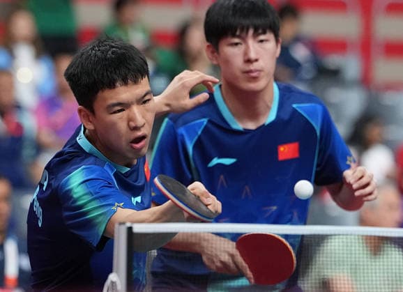 (260925) -- TOYOTA, Sept. 25, 2026 -- Wen Ruibo Xiang Peng (L) of China compete during the men s doubles round 2 match of Table tennis, Tischtennis against Ebrahim Gurban Magd Aldhubhani of Yemen at the 20th Asian Games Aichi-Nagoya 2026 in Toyota of Aichi Prefecture, Japan, Sept. 25, 2026. ) (SP)JAPAN-TOYOTA-ASIAN GAMES-TABLE TENNIS-MEN S DOUBLES CheongxKamxKa 