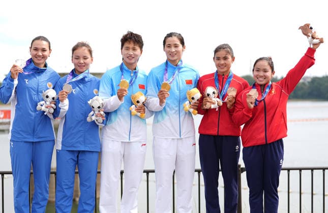(260925) -- NAGOYA, Sept. 25, 2026 -- Gold medalists Sun Mengya (3rd R) Ma Yanan (3rd L) of China, silver medalists Shohsanam Sherzodova (2nd L) Nilufar Zokirova (1st L) of Uzbekistan and bronze medalists Diep Thi Huong (2nd R) Nguyen Thi Huong of Vietnam pose during the victory ceremony for the women s canoe double 500m of Canoe Sprint at the 20th Asian Games Aichi-Nagoya 2026 in Miyoshi of Aichi Prefecture, Japan, Sept. 25, 2026. ) (SP)JAPAN-NAGOYA-ASIAN GAMES-CANOE SPRINT-WOMEN S CANOE DOUBLE 500M-FINAL ZhangxHaobo 
