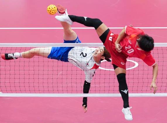 (260925) -- NAGOYA, Sept. 25, 2026 -- Han Yeji of team South Korea defends Wilaiwan Khodphom (R) of team Thailand during the women s team regu gold medal match between team South Korea and team Thailand of sepaktakraw at the 20th Asian Games Aichi-Nagoya 2026 in Nagoya, Japan, Sept. 25, 2026. ) (SP)JAPAN-NAGOYA-ASIAN GAMES-SEPAKTAKRAW-WOMEN S TEAM REGU-GOLD MEDAL MATCH WangxFei 