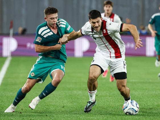 UEFA Nations League Group Stage, Boris Paitchadze Dinamo Arena, Tbilisi, Georgia 25 9 2026 Georgia vs Northern Ireland Georgia s Luka Lochoshvili with Northern Ireland™s Patrick Kelly Luka Lochoshvili with Patrick Kelly 25 9 2026  Copyright: xx Georgia v N Ireland_049