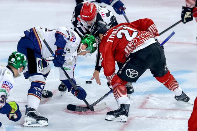 September 25, 2026, Ice Hockey, DEL, Kölner Haie vs. Eisbären Berlin, Matchday 3, 2026–27 Season, Lanxess Arena, Cologne: Markus Vikingstad of Eisbären Berlin (No. 37) battles Juhani Tyrväinen of Kölner Haie (No. 21) for the faceoff in North Rhine-Westphalia, Germany