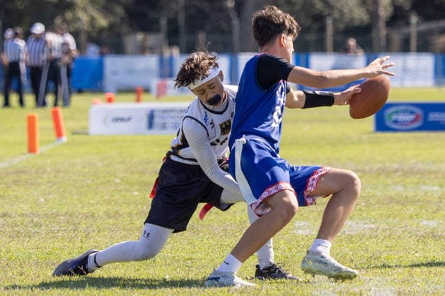 slovakia player runs with the ball and is tackled by german player, U15 Mixed Germany vs Slovakia IFAF European Youth Championships 2026, 24.09.2026 Lido Delle Nazioni Lido Delle Nazioni Italia Copyright: xPFA BjörnxKeckerx