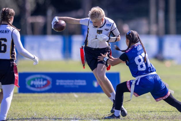 german player runs with the ball and is tackled by slovakia player, U15 Mixed Germany vs Slovakia IFAF European Youth Championships 2026, 24.09.2026 Lido Delle Nazioni Lido Delle Nazioni Italia Copyright: xPFA BjörnxKeckerx