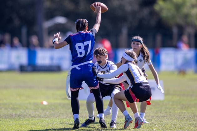 slovakia player runs with the ball and is tackled by german player, U15 Mixed Germany vs Slovakia IFAF European Youth Championships 2026, 24.09.2026 Lido Delle Nazioni Lido Delle Nazioni Italia Copyright: xPFA BjörnxKeckerx