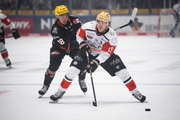 Eric Uba, Löwen Frankfurt, 18, Austin Magera, Nuremberg Ice Tigers, 19 (GER), Löwen Frankfurt vs. Nuremberg Ice Tigers, ice hockey, Penny DEL, Matchday 3, 2026–2027 season, September 25, 2026 Eibner Press Photo Attila Ziga GER, Löwen Frankfurt vs. Nuremberg Ice Tigers, Ice Hockey, Penny DEL, Matchday 3, 2026–2027 Season, September 25, 2026 Frankfurt Copyright: xEibner-Pressefotox EP_AZA
