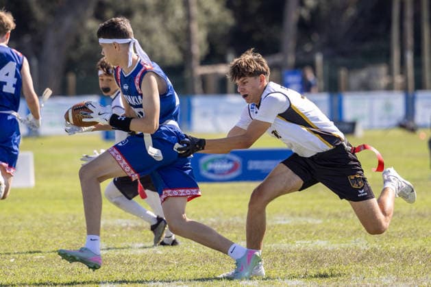 slovakia player runs with the ball and is tackled by german player, U15 Mixed Germany vs Slovakia IFAF European Youth Championships 2026, 24.09.2026 Lido Delle Nazioni Lido Delle Nazioni Italia Copyright: xPFA BjörnxKeckerx