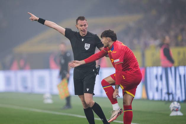 September 25, 2026: Andrei RaÈ›iu of Romania and referee OndÅ™ej Berka during the Nations League soccer match between Sweden and Romania on September 25, 2026 in Stockholm. Photo by Kenta Jönsson. BILDBYRAN COP 210 JM0854 bbeng soccer football fotball Nations League UEFA Nations League Sweden Sweden A Romania  Copyright: KENTAxJÖNSSON BB260925KJ014