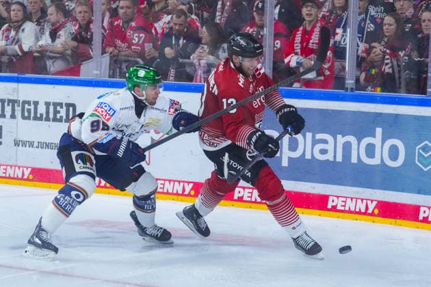 September 25, 2026, xydrx, Ice Hockey, Penny DEL, Kölner Haie vs. Eisbären Berlin, 2026–2027 season, Lanxess Arena Cologne, Frederik Tiffels, Eisbären Berlin, No. 95 in a duel against Valtteri Kemilaeinen of the Kölner Haie, No. 13 Copyright: HMBxMedia YannisxDreimann