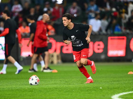 Turkiye v France - UEFA Nations League KOCAELI, TURKIYE - SEPTEMBER 25: Turkiye national team, Nationalteam player Arda Guler (10) takes to the pitch to warm up ahead of the UEFA Nations League A League Group 1 match between Turkiye and France at Kocaeli Stadium in Kocaeli, Turkiye, on September 25, 2026. Turkiye national team players wear black T-shirts featuring a photo of Ebubekir Ucar, a Turkish Football Federation (TFF) staff member who died in a traffic accident, to honor his memory before the match. Oguz Yeter Anadolu Kocaeli Turkey. Editorial use only. Please get in touch for any other usage.  Copyright: x2026xAnadoluxOguzxYeterx