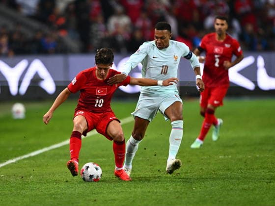 Turkiye v France - UEFA Nations League KOCAELI, TURKIYE - SEPTEMBER 25: Arda Guler (10) of Turkiye in action against Kylian Mbappe (10) of France during the UEFA Nations League A League Group 1 match between Turkiye and France at Kocaeli Stadium in Kocaeli, Turkiye, on September 25, 2026. Oguz Yeter Anadolu Kocaeli Turkey. Editorial use only. Please get in touch for any other usage.  Copyright: x2026xAnadoluxOguzxYeterx