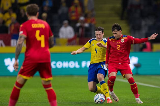 September 25, 2026: Elliot Stroud of Sweden and Andrei RaÈ›iu of Romania during the Nations League soccer match between Sweden and Romania on September 25, 2026 in Stockholm. Photo by Kenta Jönsson, BILDBYRAN COP 210 JM0854 bbeng soccer football fotball Nations League UEFA Nations League Sweden Sweden A Romania Romania  Copyright: KENTAxJÖNSSON BB260925KJ025